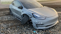A Tesla owner says his car's ‘self-driving' technology failed to detect a moving train ahead of a crash caught on camera